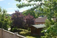 Bild (22a82cab77b5738fbbfa8aeaf4ea4958): Massives Naturstamm-Holzhausaus kanadischer Red Cedar,in Gr�nenbach im Westallg�u.