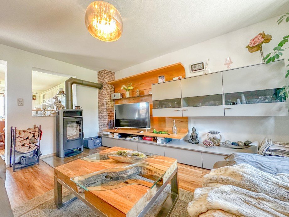 Wohnzimmer mit Kamin Erdgeschosswohnung Oberstaufen / Steibis