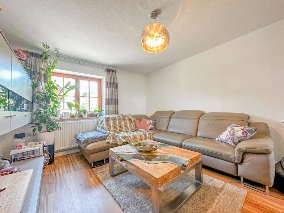 Wohnzimmer mit Kamin Erdgeschosswohnung Oberstaufen / Steibis